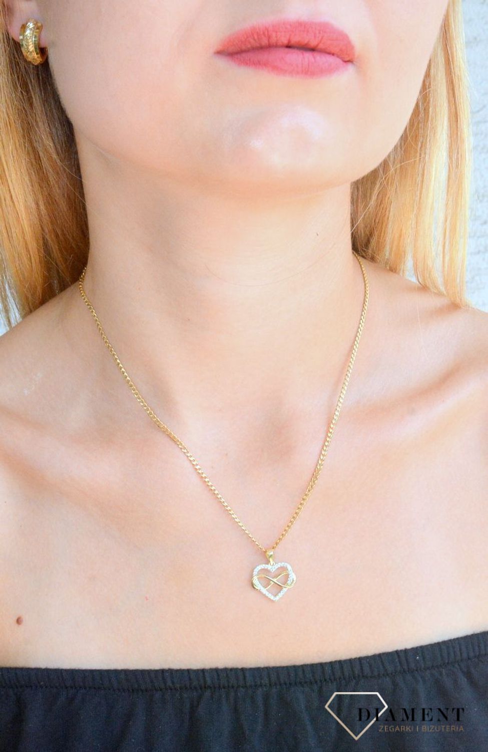 Złota zawieszka 375 serduszko ze znakiem nieskończoności ZA 3432A 375. Złota zawieszka serduszko z cyrkoniami. Zawieszka złota damska. Złoty damski wisiorek. Złota zawieszka nieskończoność.Zawieszka złota na pr.jpg